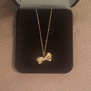 Elegant Gold Bow Pendant Necklace